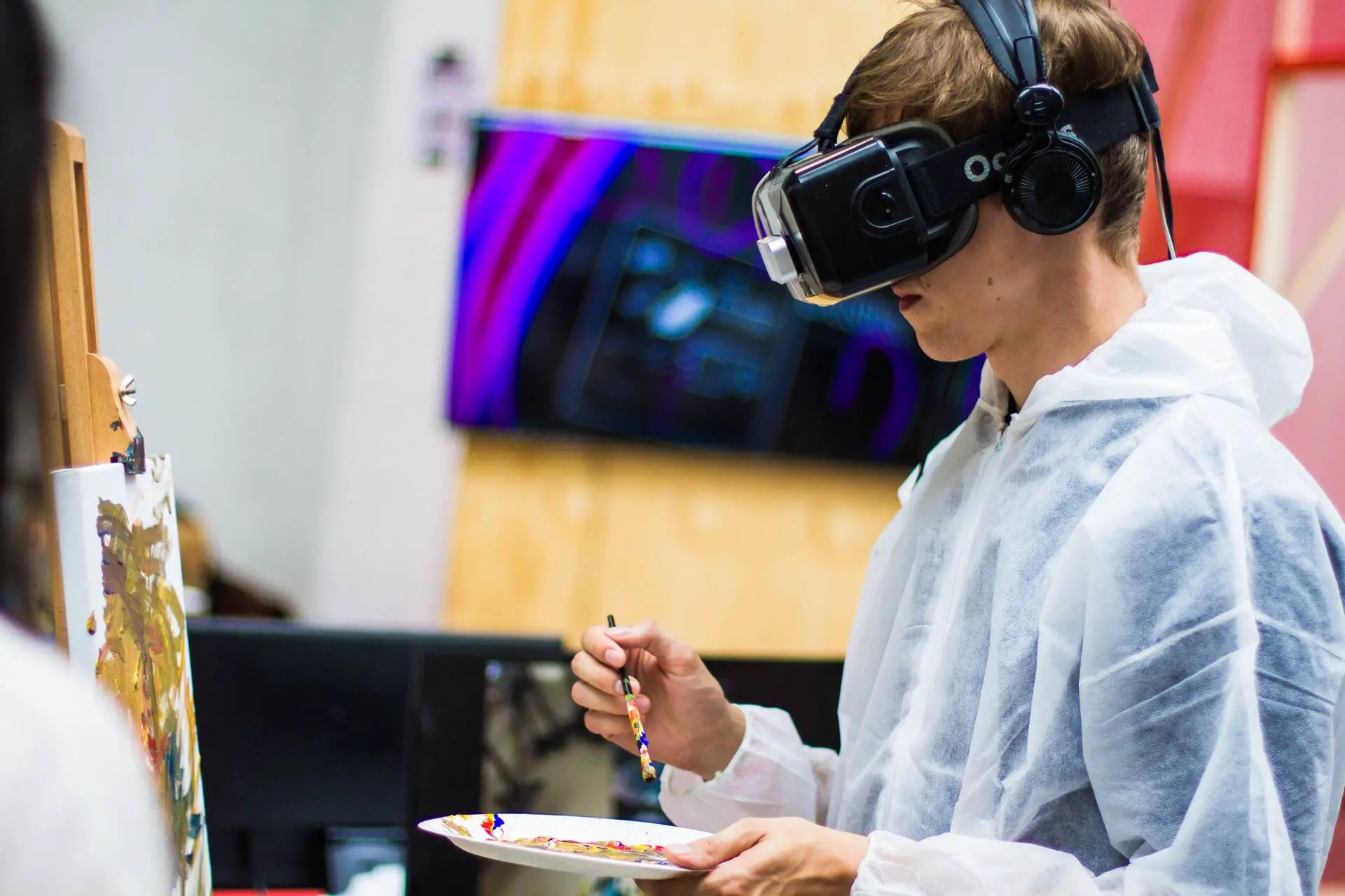 Child painting device over eyes and a headset